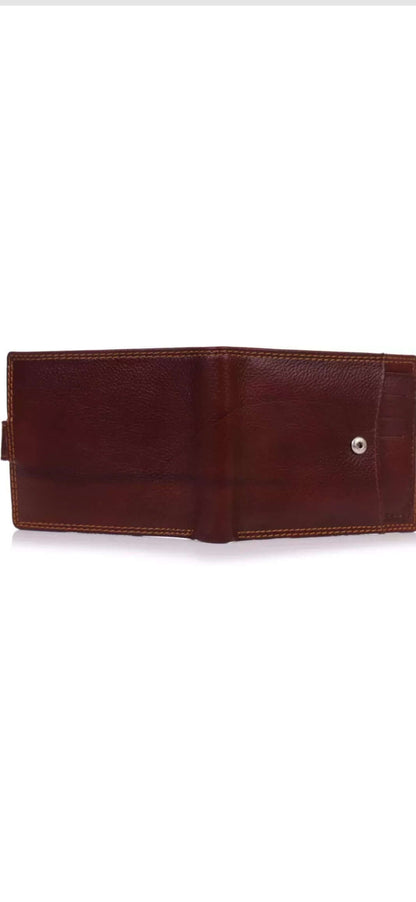 This image is for a listing on my shopify store, unique craftworks. this is a brown genuine leather wallet with multiple pockets, space for cards and strap for closure.